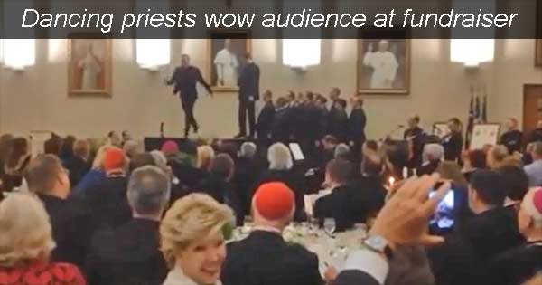 Priests taking part in a dance off at a fundraiser