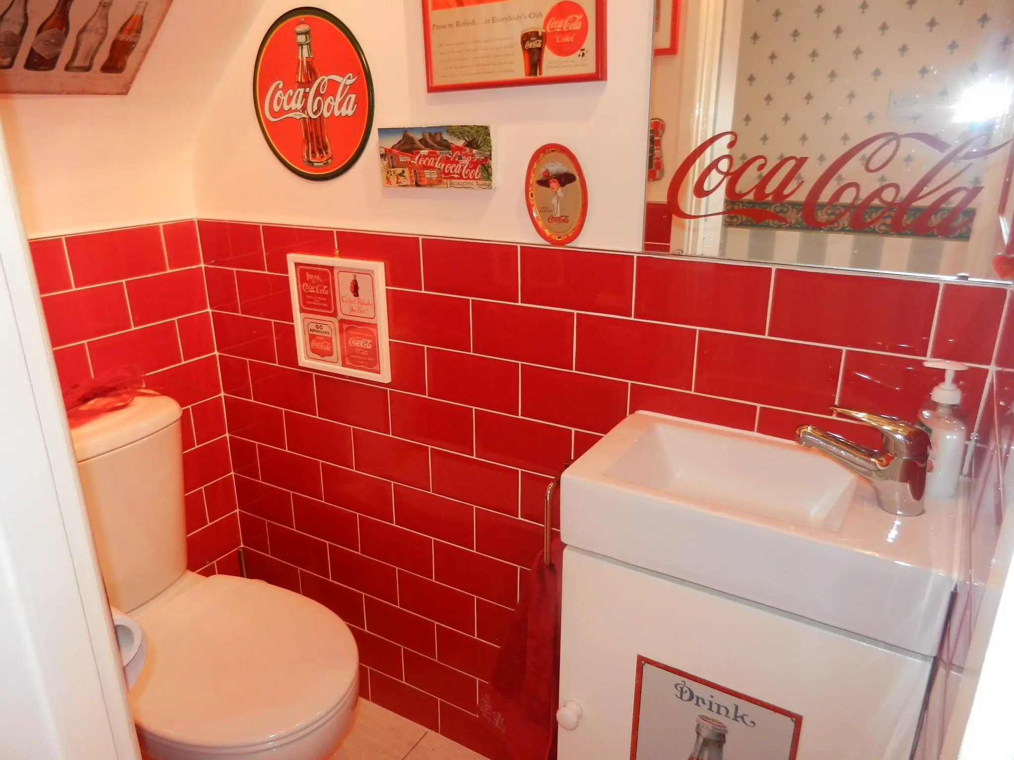 Coca Cola mum transforms home into shrine to fizzy drink. Photo from Facebook