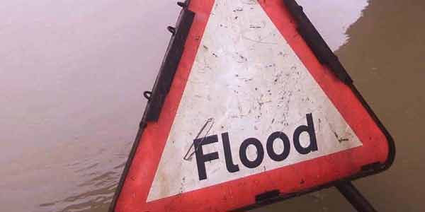Body found after pensioner swept away in floods