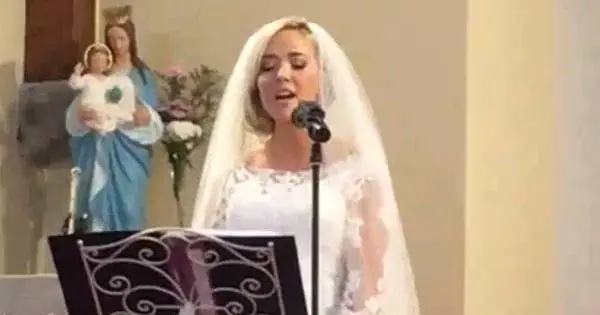 Irish bride Siobhán Friary sings the prayer at her wedding ceremony