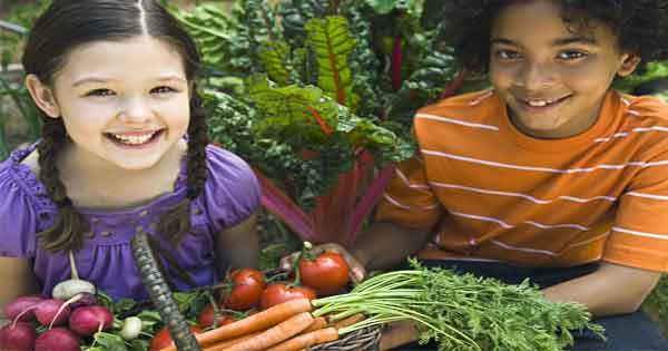 Children with fruit and veg