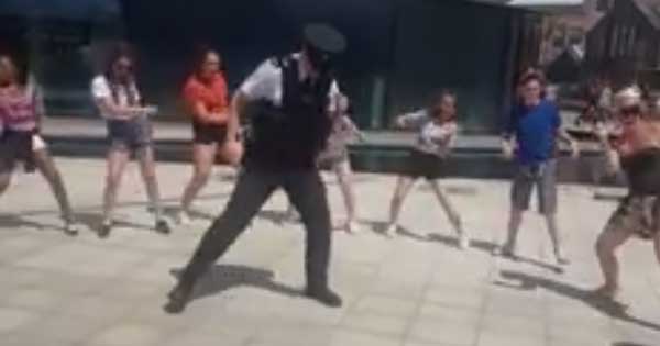 Dancing policeman delights crowd at Titanic building