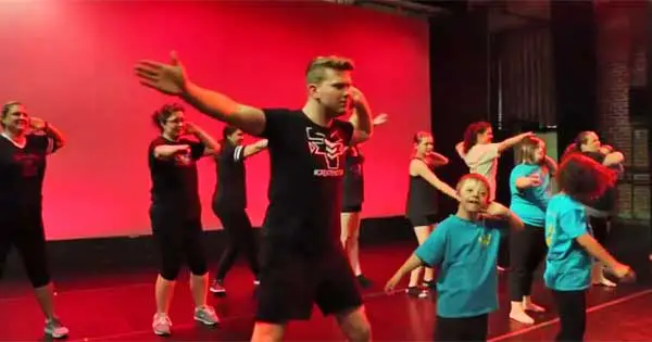 Fusion fighters stars teaching moves to special needs children from Miracles in Motion