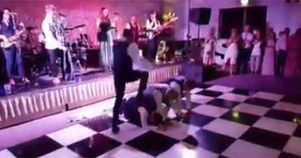 Irish groom performs a special dance routine at his wedding reception