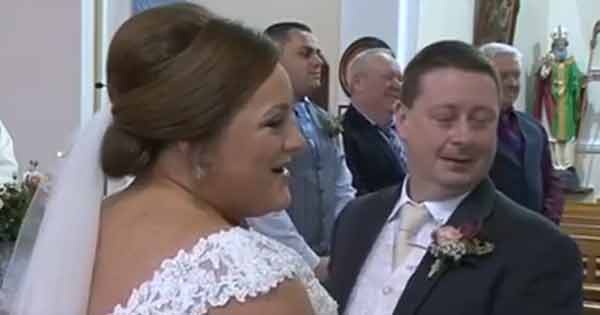 Bride delighted by father's surprise wedding song