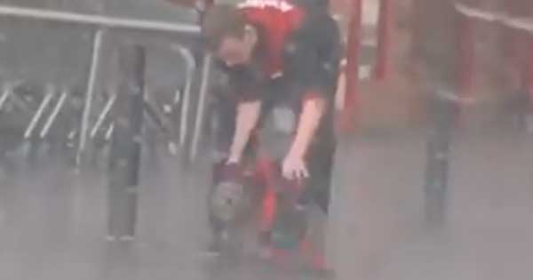 Kind-hearted Irish lad gives his coat up for dog tied up in the rain