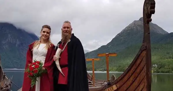 Beautiful bride and groom tie the knot in traditional Viking wedding
