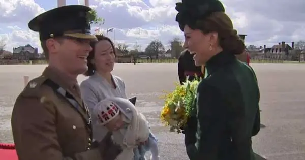 Kate Middleton laughs with Irish Guard