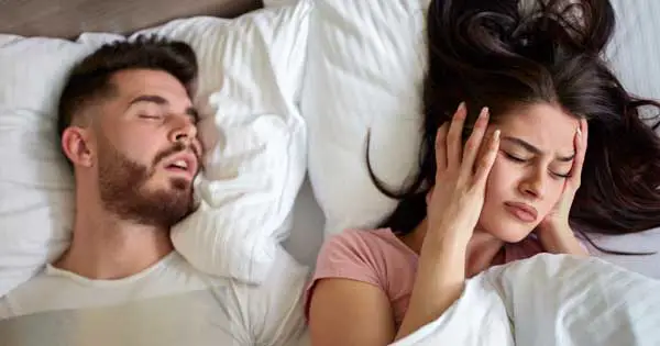 man snoring keeps woman awake