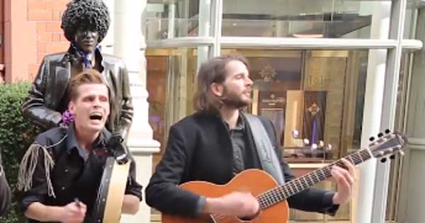 Folk duo sings Thin Lizzy songs on street as tribute to rock legends