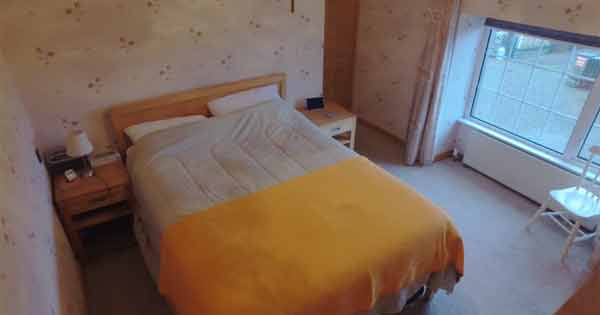 Donegal farmhouse orange bedroom