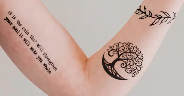 Some people combine text messages and tree designs in their tattoos.